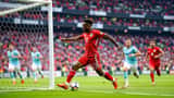 Petar Musa transfer rumours 2026 - professional football striker celebrating a goal