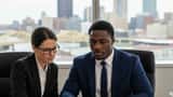 Young NFL Draft prospect reviews contract documents with sports attorney in Pittsburgh 2026