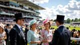 Horses racing on the turf at Royal Ascot with spectators in summer dress