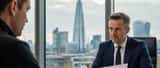 British employment lawyer reviewing a football manager's contract in a professional London office