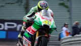 Motos MotoGP en pleine course sur circuit, pilotes en combinaison, vue aérienne de virage