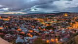 Evening panoramic view of Tbilisi, Georgia at dusk, the city the second leg of Larne vs Iberia 1999 will be played in
