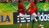 Bruma com a camisola da seleção portuguesa de futebol em campo
