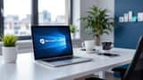 IT professional troubleshooting Microsoft Teams outage on a laptop in a modern office