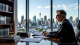 Criminal defence lawyer reviewing self-defence case file in Sydney law firm office