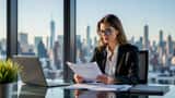 Female employment attorney reviewing workplace contracts in a Manhattan law office with fashion magazine references