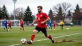 Joueur de soccer amateur s'échauffant en bord de terrain avant d'entrer en jeu
