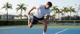 Professional tennis player warming up on hard court in Florida sunshine, sports medicine concept