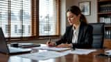 Female solicitor reviewing domestic violence case files in a London law office