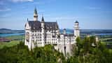 Schloss Neuschwanstein in Bayern – Symbol für Reisen und Arbeit als Selbstständiger