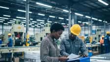 South Carolina labor compliance inspector comparing employment records at a manufacturing facility in Greenville, SC