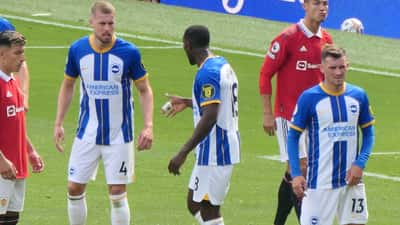 Brighton and Hove Albion players in action during a Premier League match