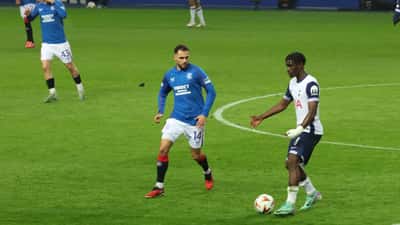 Rangers FC players in action against Tottenham Hotspur, Ibrox Stadium
