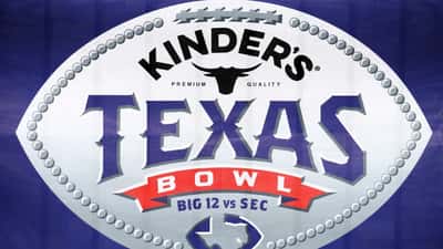 Texas college football game atmosphere with crowd and players on field representing the NIL compensation divide between FCS and FBS programs in 2026