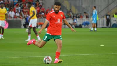 Noussair Mazraoui in action for Morocco, wearing the national team jersey