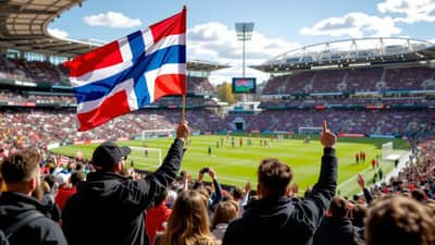 Norsk og ivoriansk supporter feirer sammen ved VM 2026