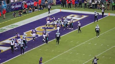 Lamar Jackson running for a touchdown for the Baltimore Ravens against the Panthers