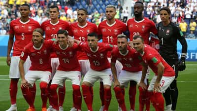 Switzerland national football team lined up at the FIFA World Cup 2018, players in red and white jerseys