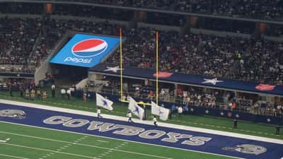 Dallas Cowboys flag team at AT&T Stadium during an NFL game 2019