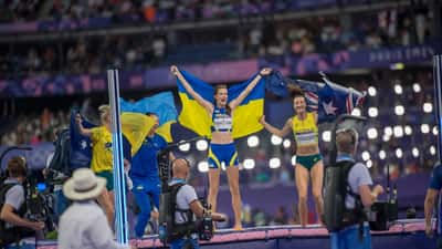 Nicola Olyslagers with teammates at the 2024 Paris Olympics women's high jump final