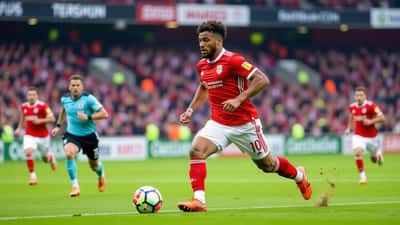 41-year-old footballer sprinting hard in a Carabao Cup preliminary-round match at a lower-league English ground