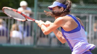 Sorana Cirstea competing in a professional tennis match