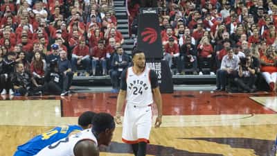 Norman Powell in Toronto Raptors uniform during a game