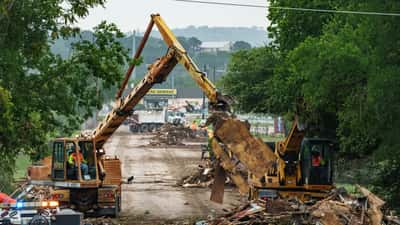 Storm and flood damage in Texas, showing aftermath of severe weather on residential property