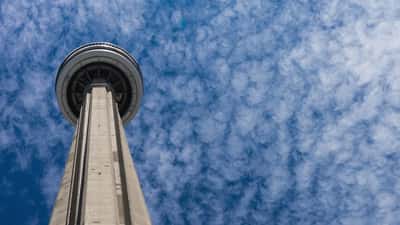 CN Tower in Toronto against a clear sky, iconic Canadian landmark