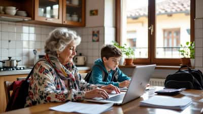 Mamma italiana consulta il portale del Comune di Catanzaro per iscrivere il figlio alla mensa scolastica 2026-2027 con attestazione ISEE sul tavolo