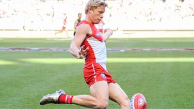 Isaac Heeney kicking during an AFL game — Sydney Swans 2026 suspension scandal
