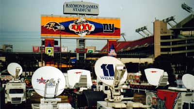 Super Bowl broadcast compound with media trucks and satellite equipment