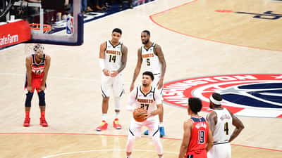Jamal Murray en action à la ligne des lancers francs lors d'un match NBA