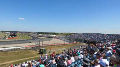 Formula 1 cars racing at Silverstone circuit during the British Grand Prix 2026