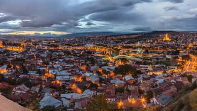 Evening panoramic view of Tbilisi, Georgia at dusk, the city the second leg of Larne vs Iberia 1999 will be played in
