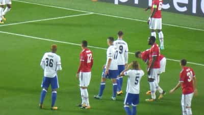 Jogadores do Manchester United em ação durante partida da UEFA Champions League em Old Trafford