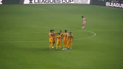 Tigres UANL players in action against Inter Miami CF during a cross-border soccer match, 2025