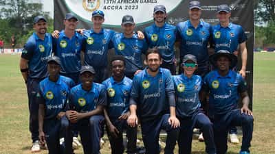 Cricket players competing at the African Games, action shot on the pitch