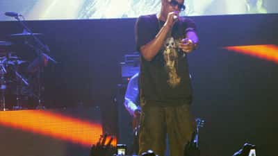 JAŸ-Z Returns at Roots Picnic 2026: Why His 30-Year Catalog Strategy Is a Wealth Masterclass