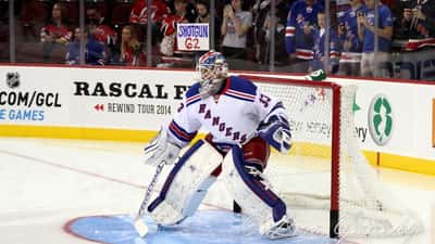 Cam Talbot NHL goalie in hockey gear during a game