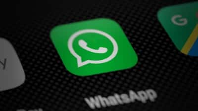 WhatsApp app icon on smartphone screen showing messaging privacy feature