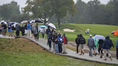 Joueurs de golf sur le green lors du PGA Tour Championship 2026