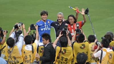 Kazuyoshi Miura with Roberto Baggio and Tsuyoshi Kitazawa in a football setting