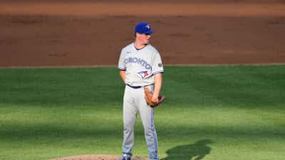 Lanceur des Blue Jays de Toronto en action sur le terrain, illustrant les blessures sportives en MLB 2026