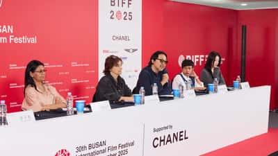 Na Hong-Jin and fellow filmmakers at the Busan International Film Festival 2025