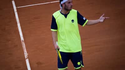 Marco Cecchinato in azione durante un torneo ATP Challenger di tennis