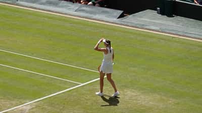 Elena Rybakina competing at Wimbledon 2026, mid-match movement on court