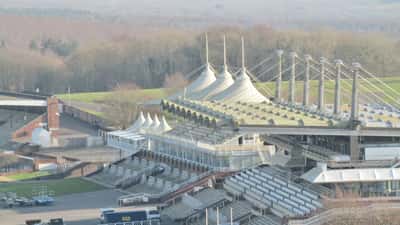 Goodwood Racecourse grandstand packed with spectators during Glorious Goodwood 2026