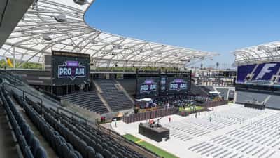 Fortnite Pro-Am gaming stadium at E3 2018 with large arena screens and competitive players