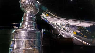 Florida Panthers players celebrating with the Stanley Cup at NASA Kennedy Space Center